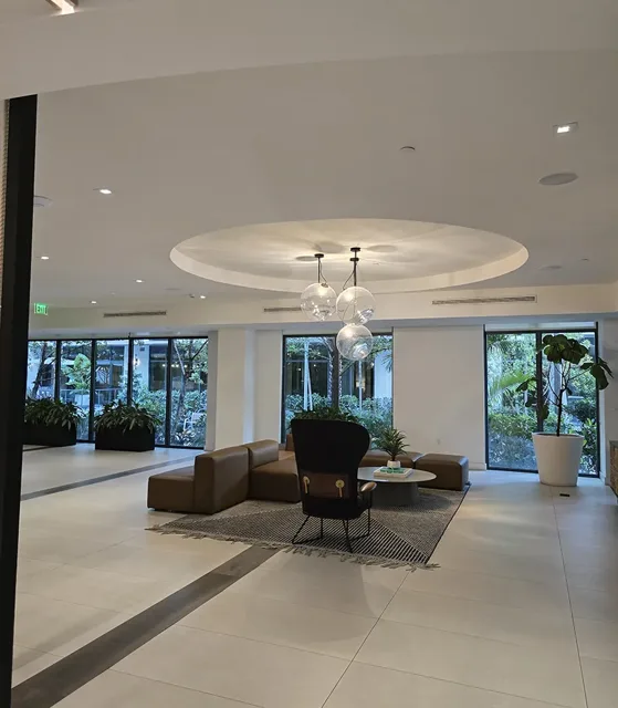 Interior with a circular ceiling feature and recessed lighting